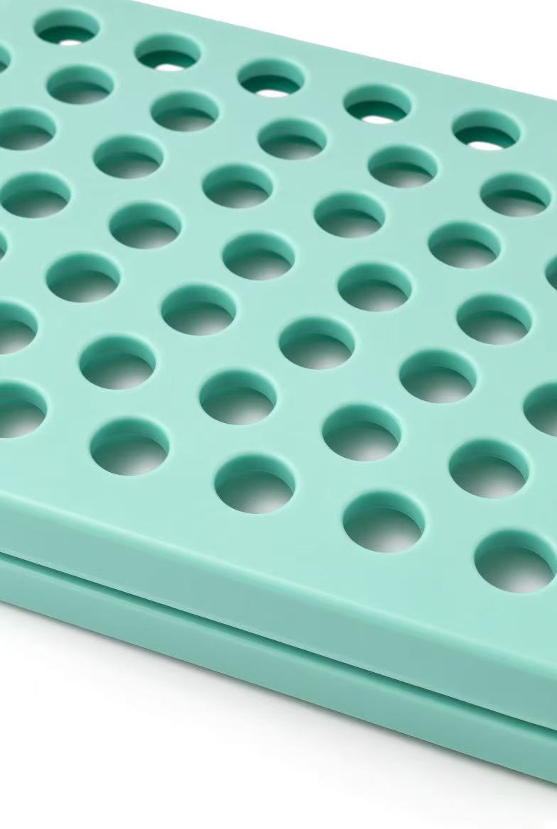 Close-up view of the reinforced durable hinge buckle on the clothes folding board designed for smooth repeated folding